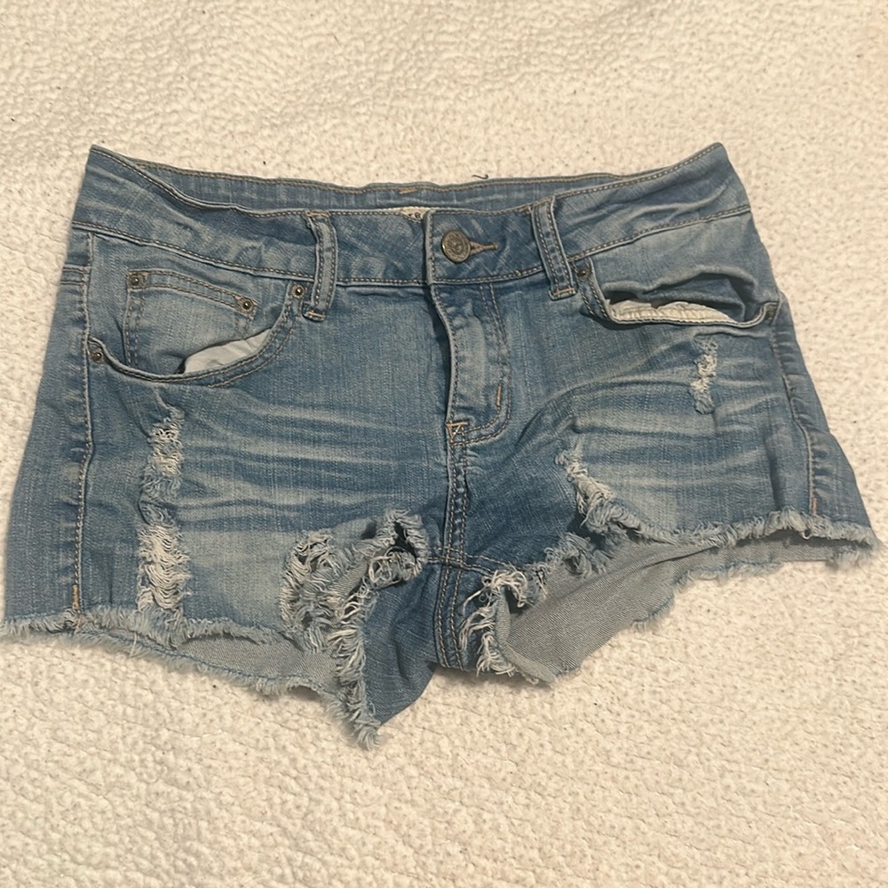 Ripped jean shorts